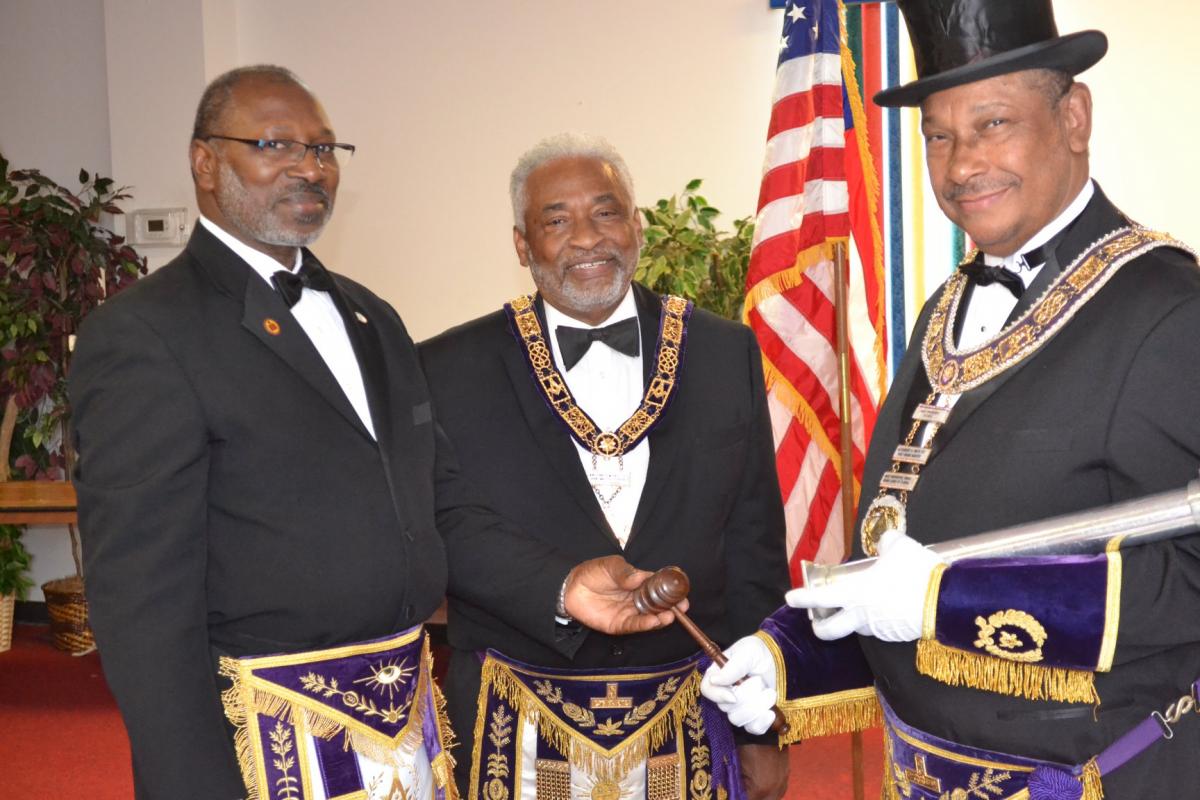 Grand Master James A. Parker, P.G.M. Alexander Smith, and brother Yates